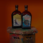 Great Jones & Jean Michel Basquiat Bottles on Wood Table