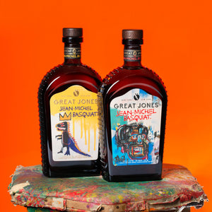 
                  
                    Great Jones & Jean Michel Basquiat Bottles on Orange Background
                  
                