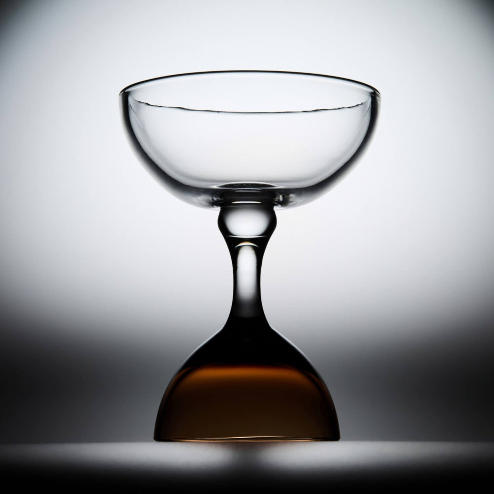 
                  
                    Hourglass Manhattan Glasses with rounded bowl and slender stem, crafted in NYC.
                  
                